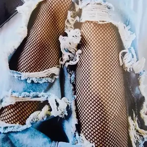 Distressed Fishnet-Style Ripped Pants